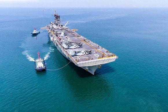 Aircraft carrier with advanced technology and operational capabilities.