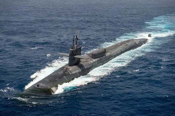 Modern submarine navigating ocean waters, showcasing advanced underwater technology.